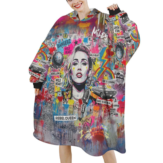 Colorful hoodie with graphic design of a face and text, worn by a person.