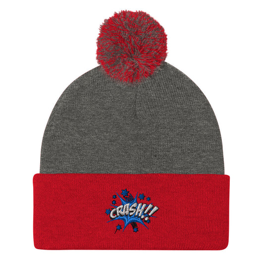 embroidered pom-pom beanie! Featuring a striking "CRASH!!" design