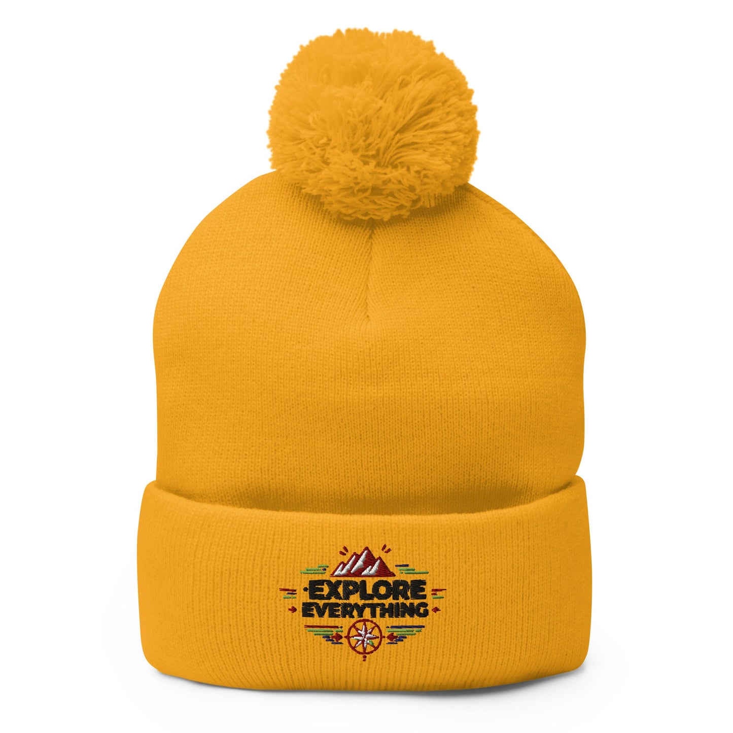 cozy embroidered pom-pom beanie! Featuring a bold "Explore Everything" design
