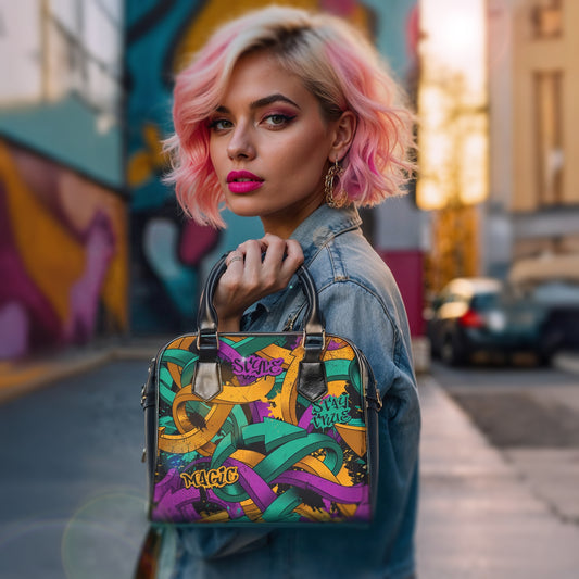 Woman with pink hair holding a colorful handbag in an urban setting