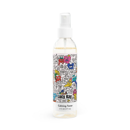 Bottle of Lucy Kay Calming Toner with colorful label on a white background