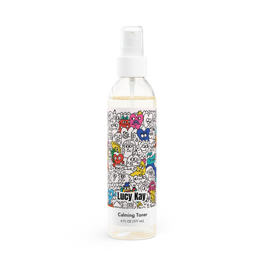 Bottle of Lucy Kay Calming Toner with colorful label on a white background