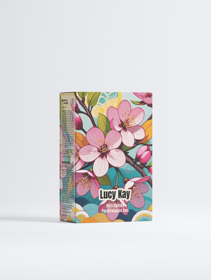 Colorful product packaging with floral design and 'Lucy Kay' branding on a white background