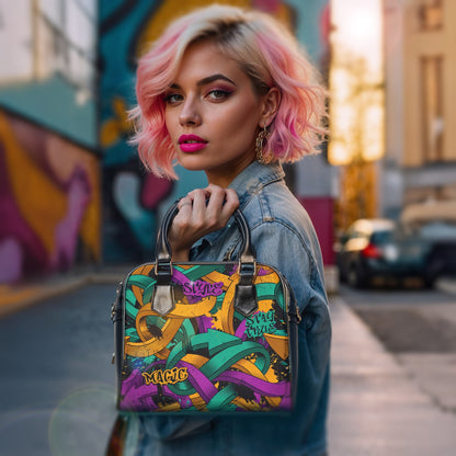 Woman with pink hair holding a colorful handbag in an urban setting